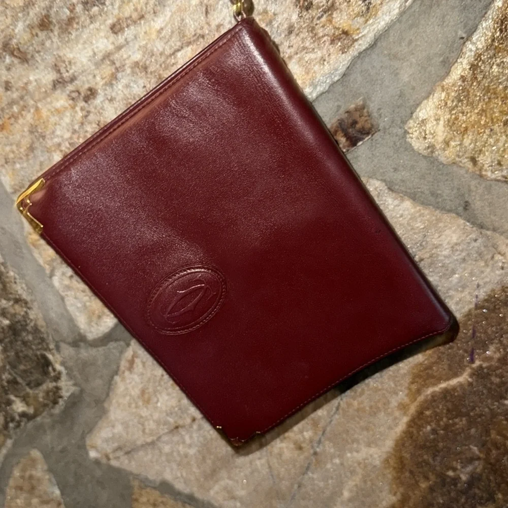 Authentic Cartier Burgundy Leather Clutch with Gold Accents - Picture 4 of 17